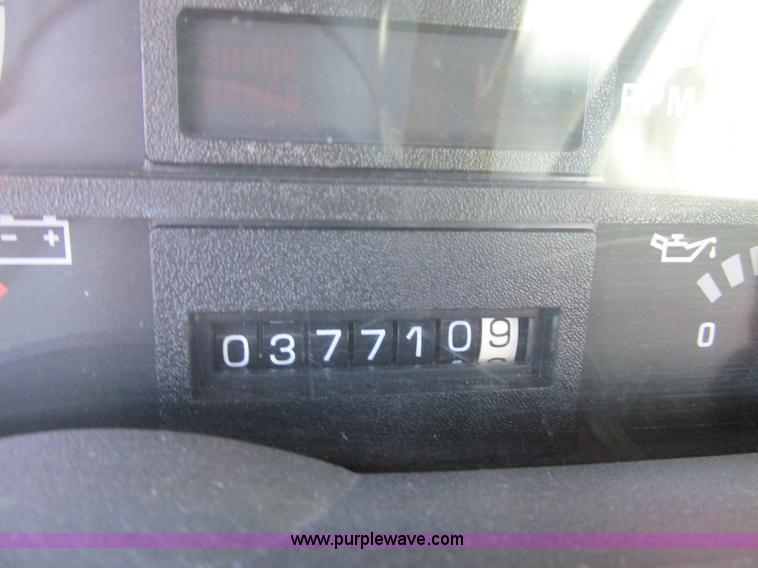 image for item K5094 1997 GMC C7500 flat bed truck with crane