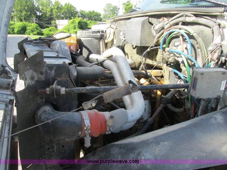 image for item K5094 1997 GMC C7500 flat bed truck with crane