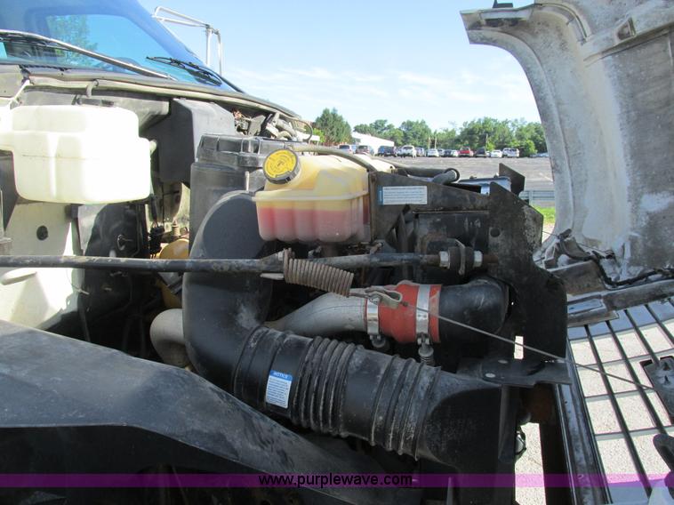 image for item K5094 1997 GMC C7500 flat bed truck with crane