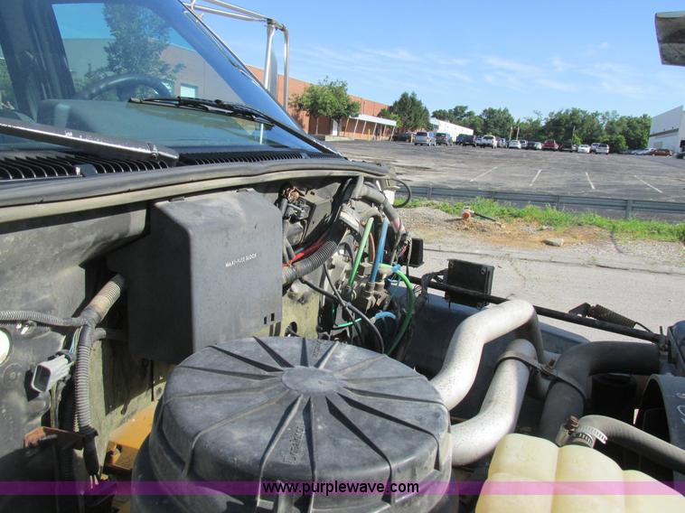 image for item K5094 1997 GMC C7500 flat bed truck with crane