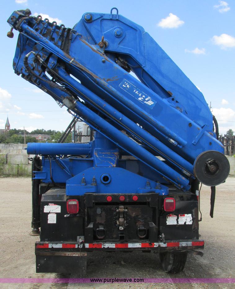 image for item K5108 1999 Freightliner FL112 flatbed truck with crane