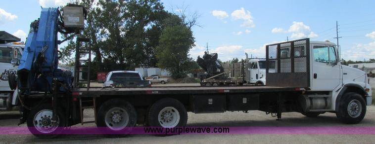 image for item K5108 1999 Freightliner FL112 flatbed truck with crane