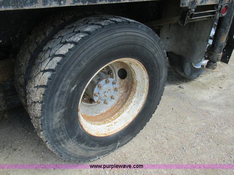 image for item K5108 1999 Freightliner FL112 flatbed truck with crane