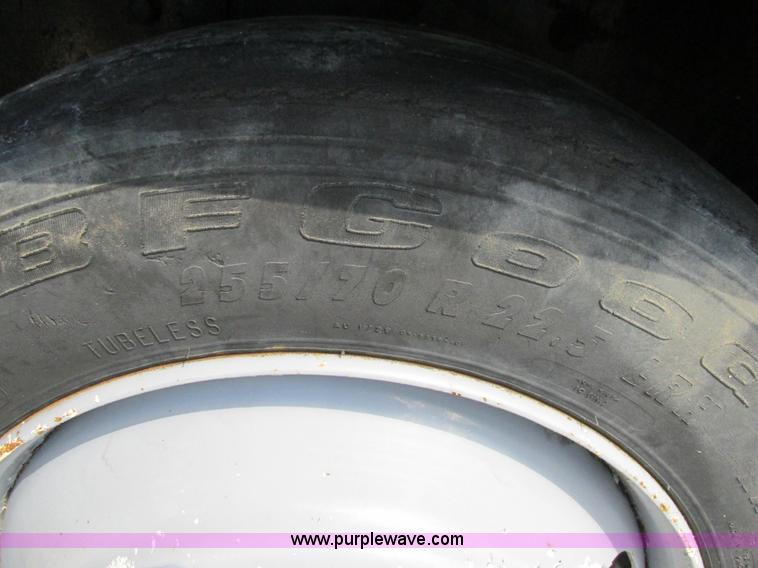 image for item K5108 1999 Freightliner FL112 flatbed truck with crane