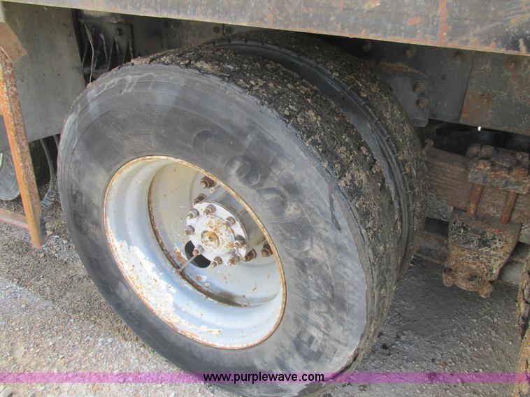 image for item K5108 1999 Freightliner FL112 flatbed truck with crane