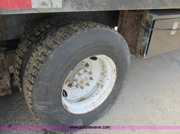 image for item K5108 1999 Freightliner FL112 flatbed truck with crane