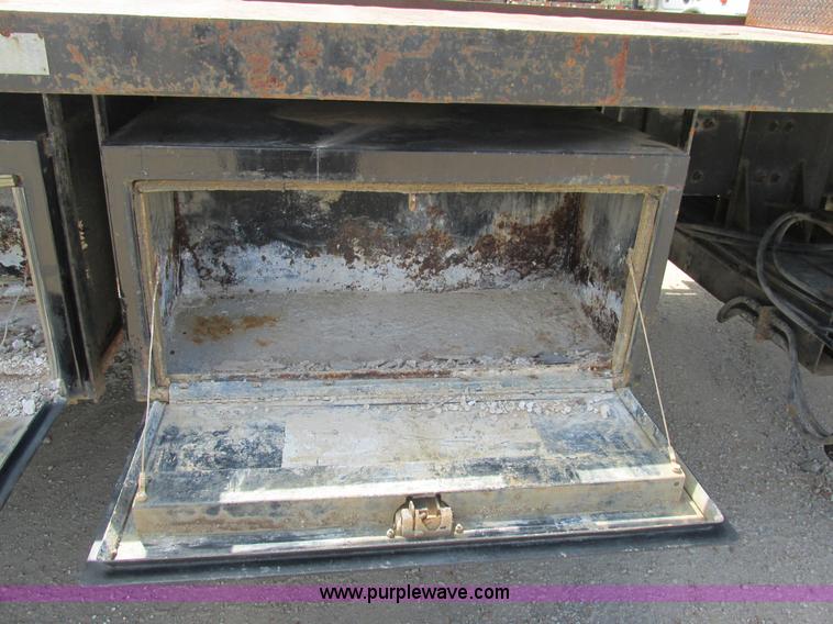 image for item K5108 1999 Freightliner FL112 flatbed truck with crane