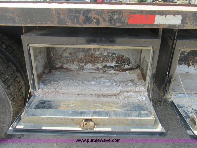 image for item K5108 1999 Freightliner FL112 flatbed truck with crane