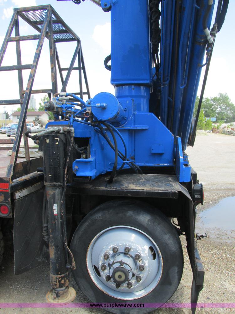 image for item K5108 1999 Freightliner FL112 flatbed truck with crane