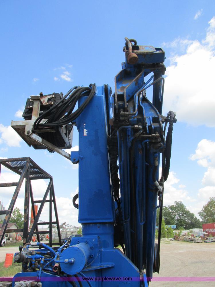 image for item K5108 1999 Freightliner FL112 flatbed truck with crane