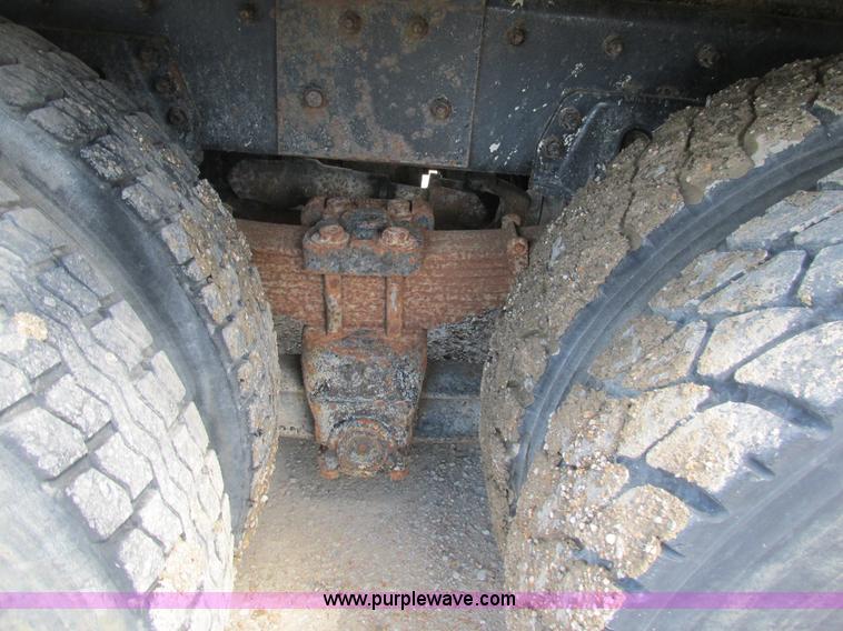 image for item K5108 1999 Freightliner FL112 flatbed truck with crane