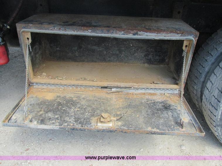 image for item K5108 1999 Freightliner FL112 flatbed truck with crane