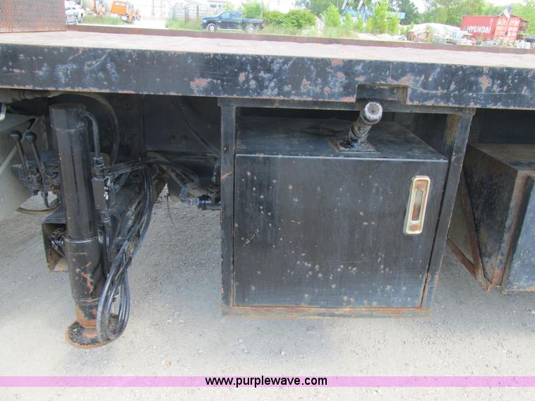 image for item K5108 1999 Freightliner FL112 flatbed truck with crane