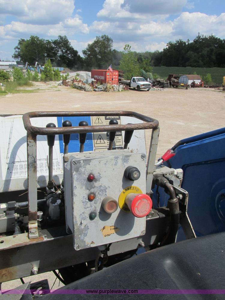 image for item K5108 1999 Freightliner FL112 flatbed truck with crane