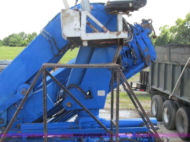 image for item K5108 1999 Freightliner FL112 flatbed truck with crane