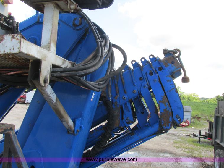 image for item K5108 1999 Freightliner FL112 flatbed truck with crane