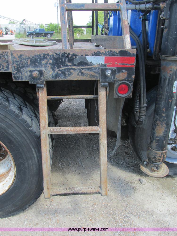 image for item K5108 1999 Freightliner FL112 flatbed truck with crane