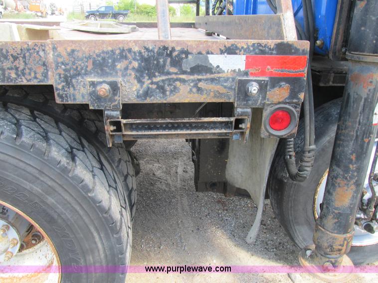 image for item K5108 1999 Freightliner FL112 flatbed truck with crane