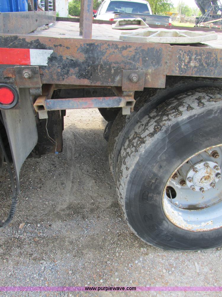 image for item K5108 1999 Freightliner FL112 flatbed truck with crane