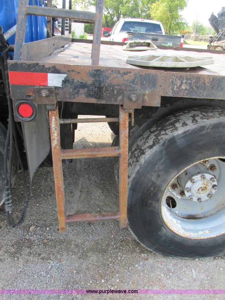 image for item K5108 1999 Freightliner FL112 flatbed truck with crane