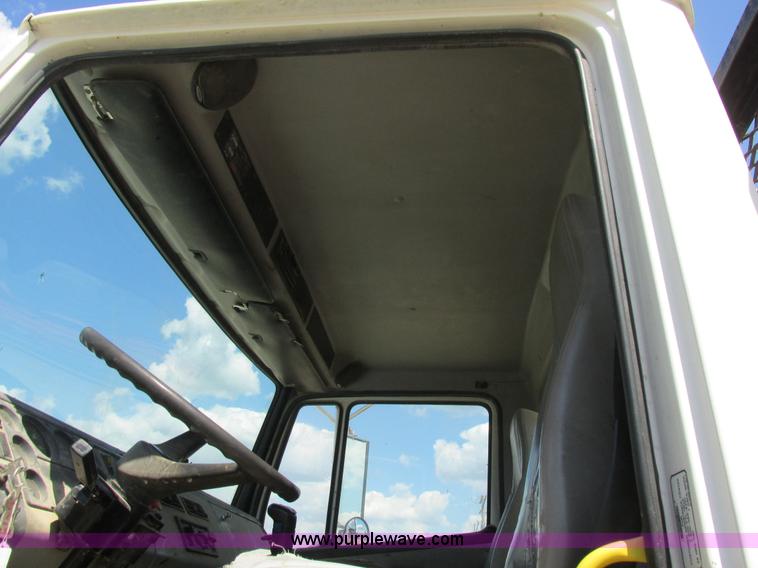 image for item K5108 1999 Freightliner FL112 flatbed truck with crane