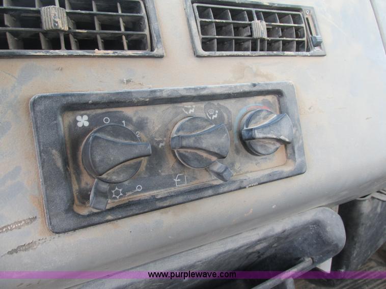 image for item K5108 1999 Freightliner FL112 flatbed truck with crane