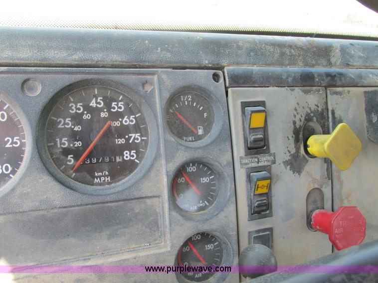 image for item K5108 1999 Freightliner FL112 flatbed truck with crane