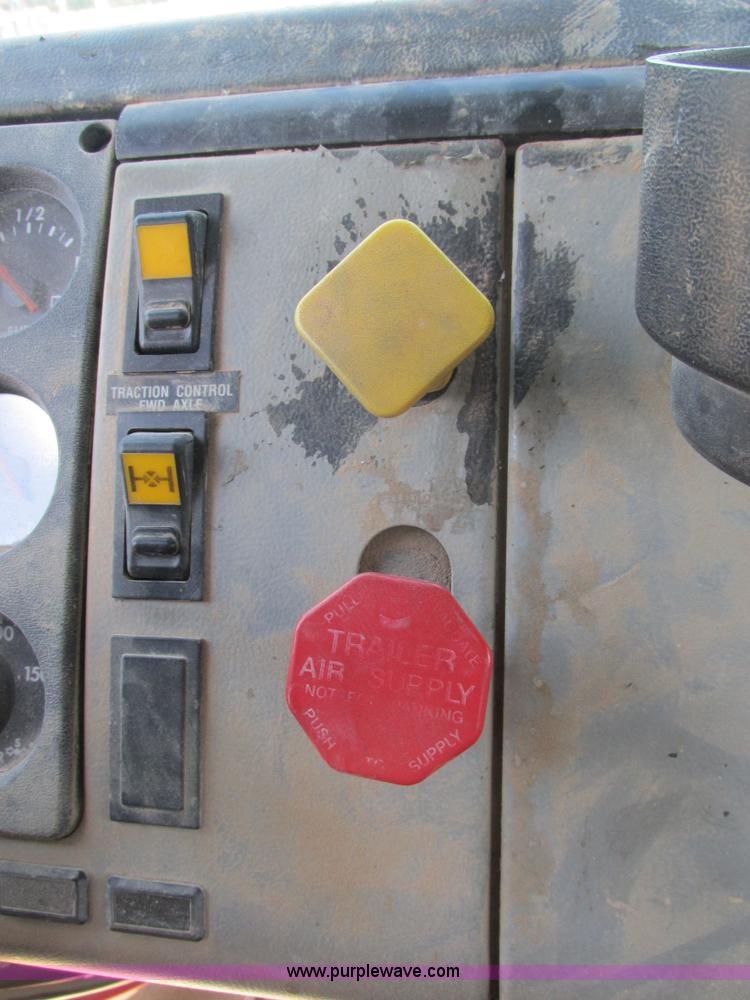 image for item K5108 1999 Freightliner FL112 flatbed truck with crane