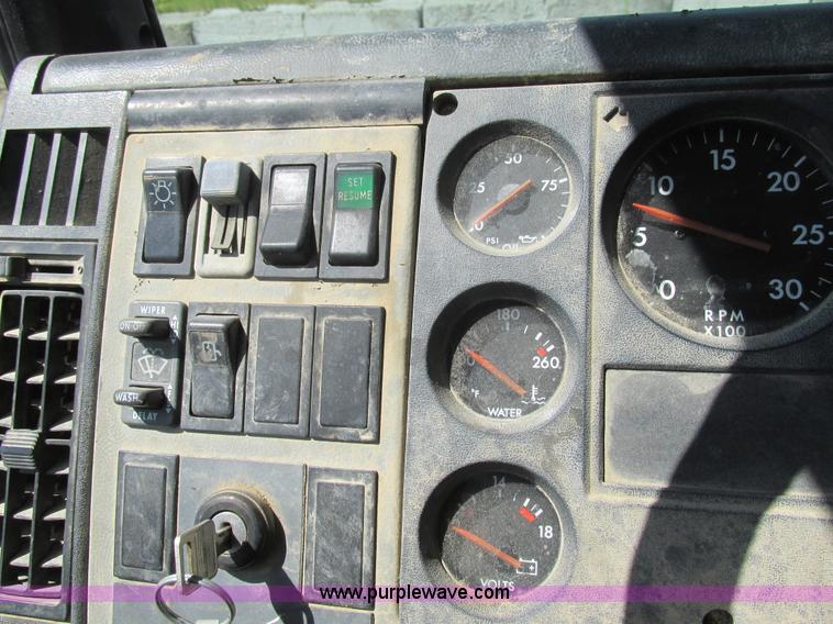 image for item K5108 1999 Freightliner FL112 flatbed truck with crane