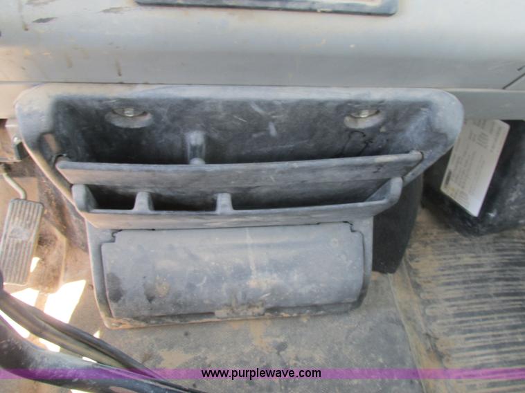 image for item K5108 1999 Freightliner FL112 flatbed truck with crane