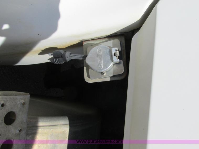 image for item K5108 1999 Freightliner FL112 flatbed truck with crane