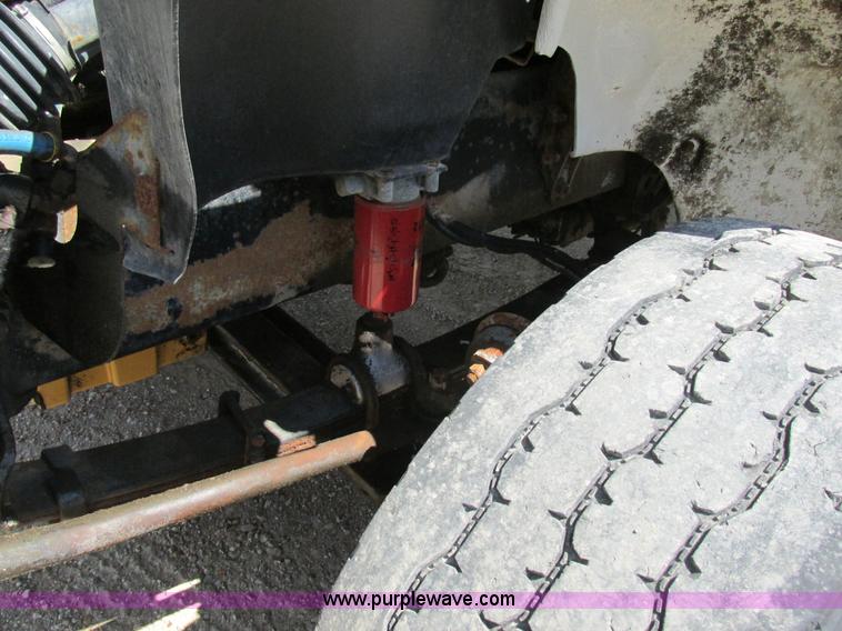 image for item K5108 1999 Freightliner FL112 flatbed truck with crane