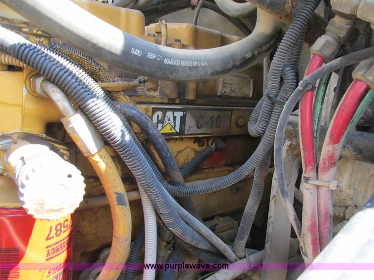 image for item K5108 1999 Freightliner FL112 flatbed truck with crane