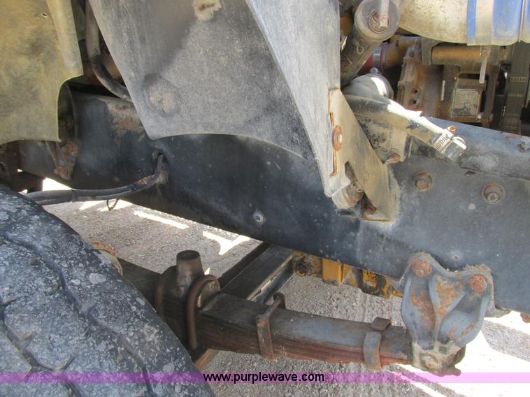 image for item K5108 1999 Freightliner FL112 flatbed truck with crane