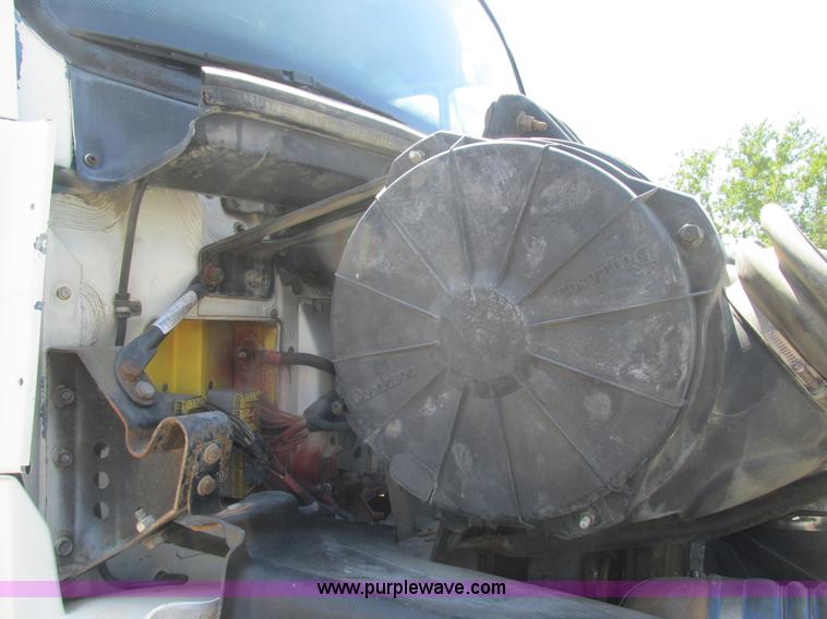 image for item K5108 1999 Freightliner FL112 flatbed truck with crane