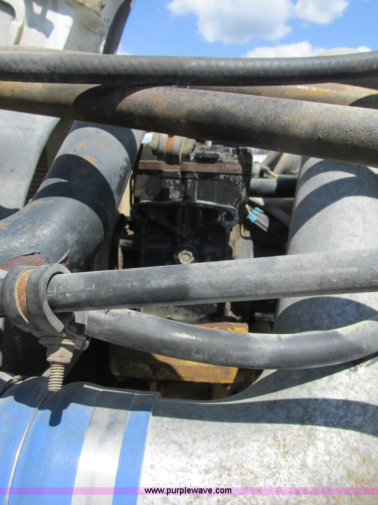 image for item K5108 1999 Freightliner FL112 flatbed truck with crane