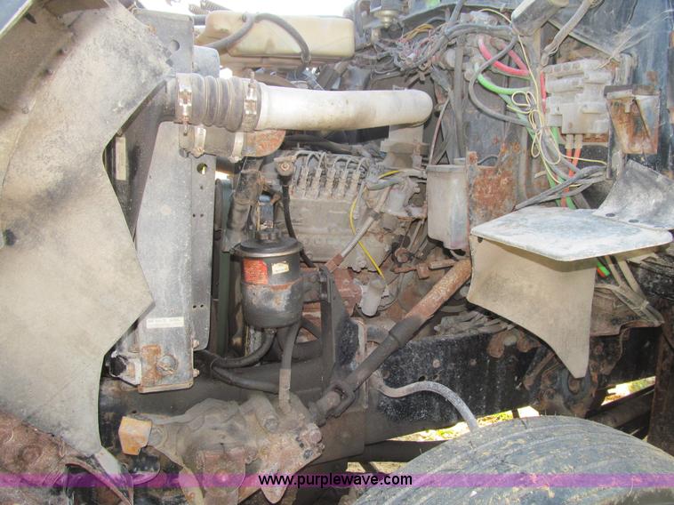 image for item K6329 1995 Ford LN8000 municipal live bottom dump truck