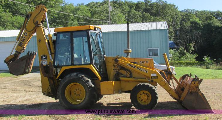 image for item L4049 1991 John Deere 310D backhoe