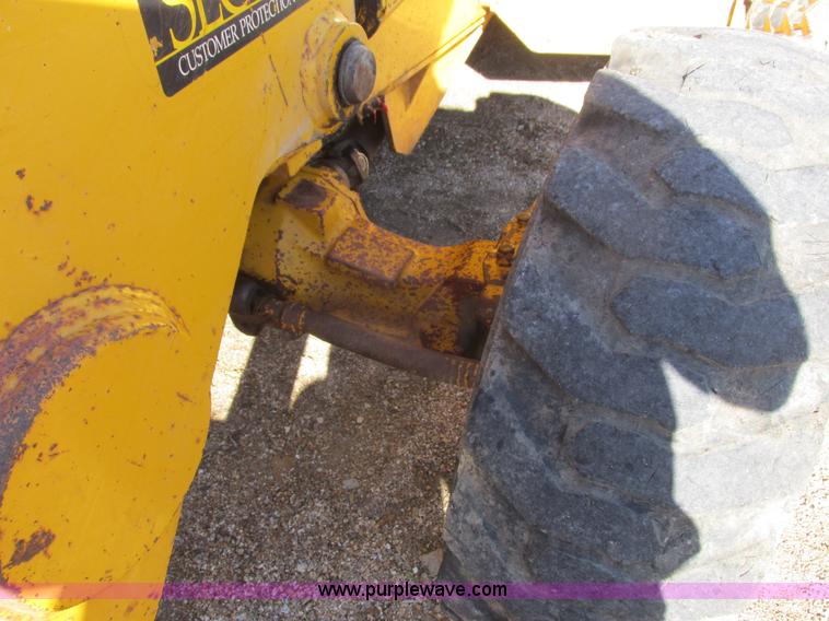 image for item L4049 1991 John Deere 310D backhoe