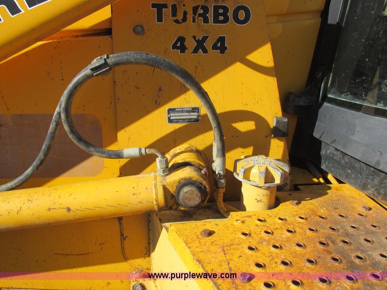 image for item L4049 1991 John Deere 310D backhoe