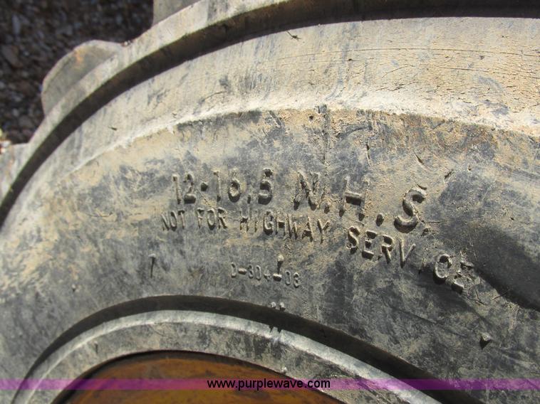 image for item L4049 1991 John Deere 310D backhoe