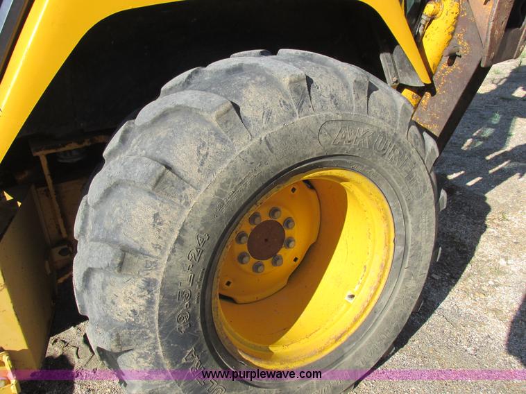 image for item L4049 1991 John Deere 310D backhoe