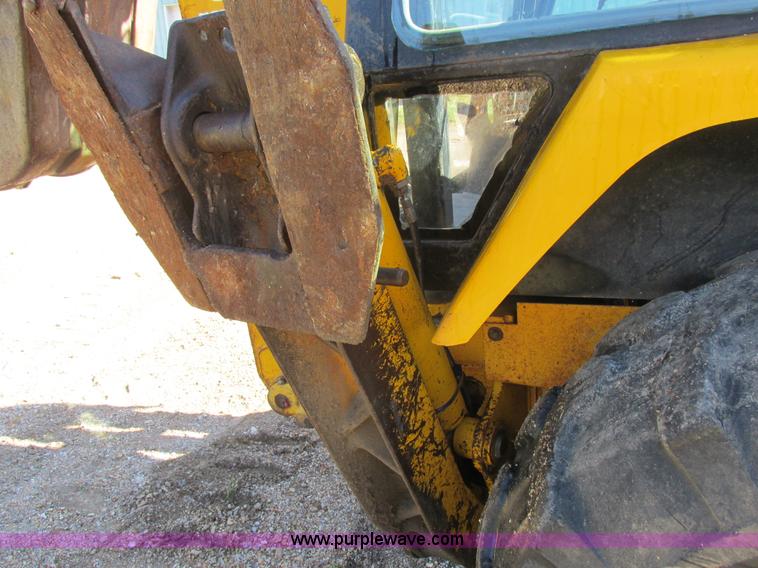 image for item L4049 1991 John Deere 310D backhoe