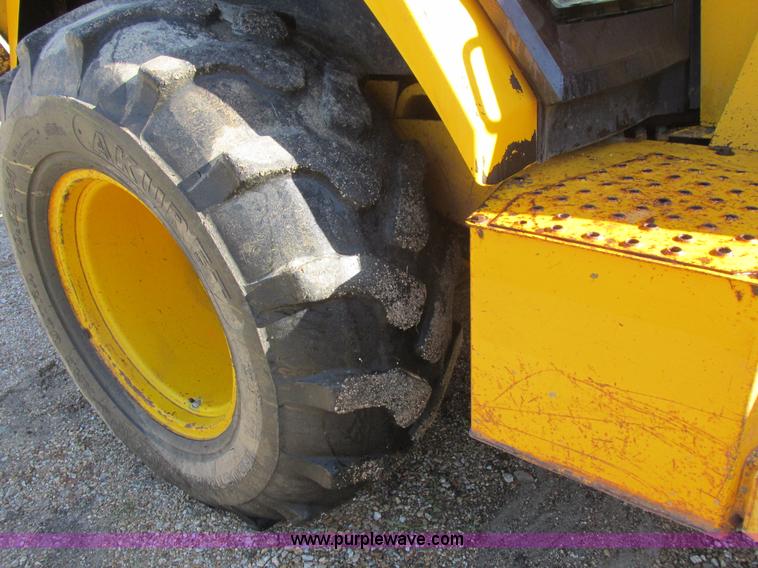 image for item L4049 1991 John Deere 310D backhoe