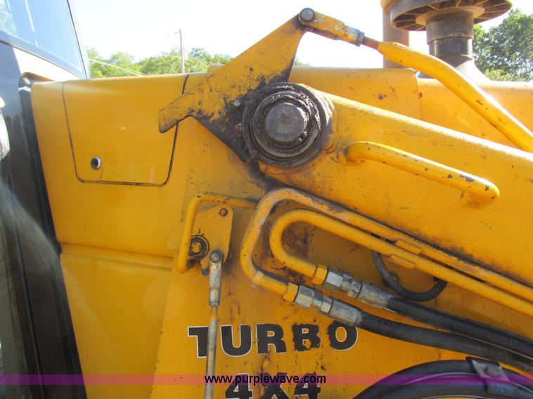 image for item L4049 1991 John Deere 310D backhoe