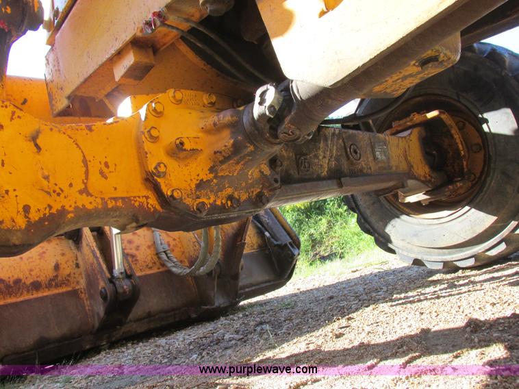 image for item L4049 1991 John Deere 310D backhoe