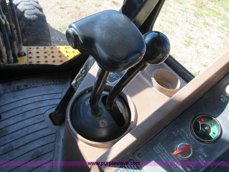 image for item L4049 1991 John Deere 310D backhoe