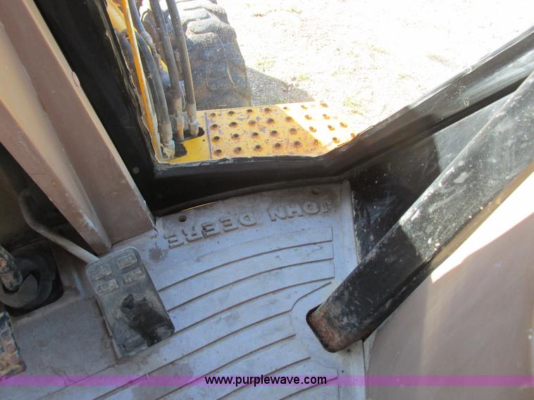 image for item L4049 1991 John Deere 310D backhoe