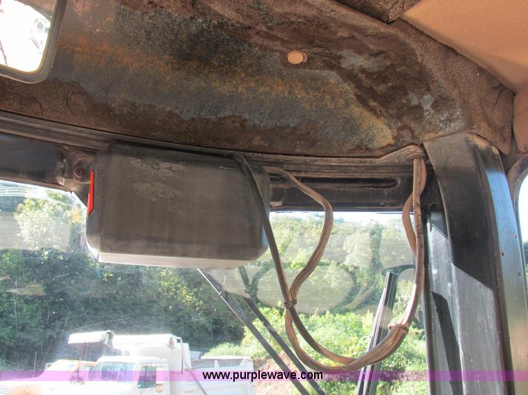 image for item L4049 1991 John Deere 310D backhoe