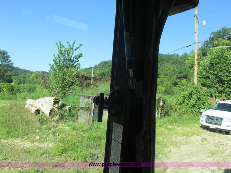 image for item L4049 1991 John Deere 310D backhoe